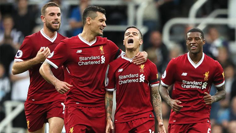 Philippe Coutinho melakukan selebrasi usai mencetak gol. Copyright: INDOSPORT