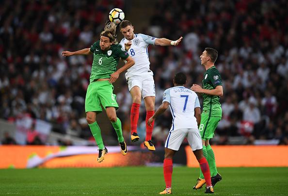 Aksi dari pertandingan Inggris vs Slovenia. Copyright: INDOSPORT