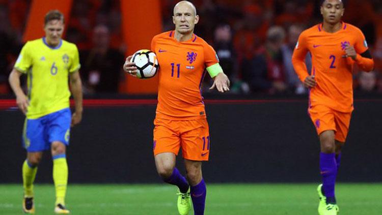 Arjen Robben usai membobol gawang Swedia. Copyright: Istimewa