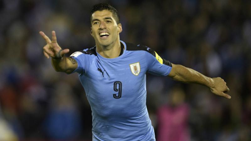 Luis Suarez kala membela Timnas Uruguay Copyright: INDOSPORT