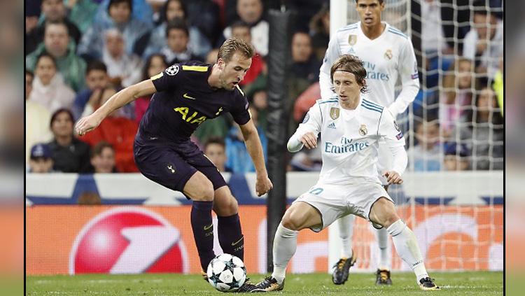 Harry Kane (kiri) saat melawan Real Madrid. Copyright: INDOSPORT