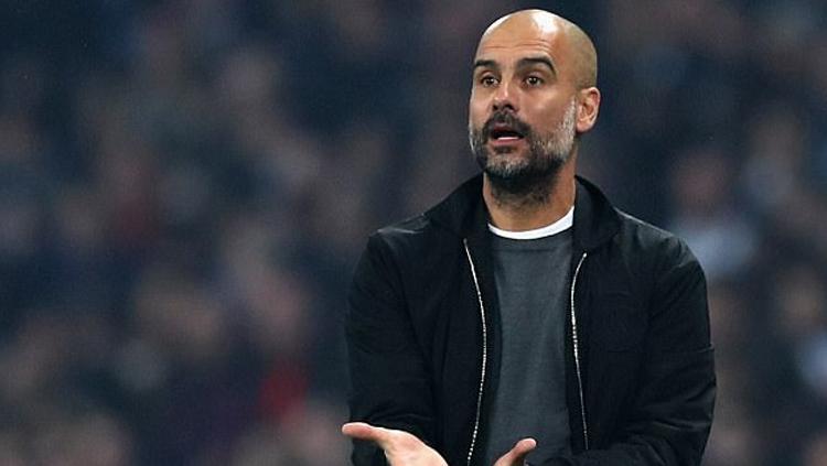 Pelatih Manchester City, Pep Guardiola berharap The Citizens menggaet bomber anyar dalam jendela bursa transfer paruh musim nanti. - INDOSPORT