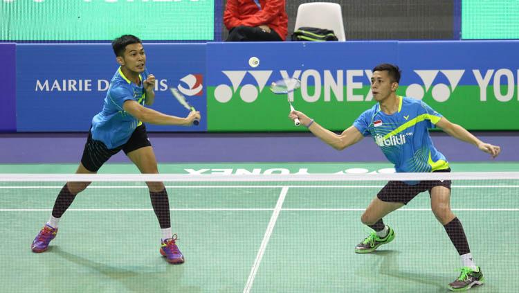 Fajar Alfian/Muhammad Rian Ardianto saat melawan Li Junhui/Liu Yuchen. Copyright: PBSI