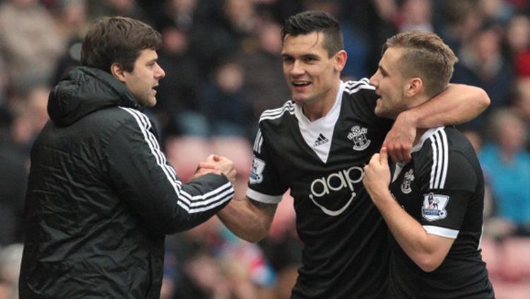 Luke Shaw (kanan) saat memperkuat Southampton bersama pelatih Mauricio Pochettino (kiri) dan Dejan Lovren. Copyright: INDOSPORT