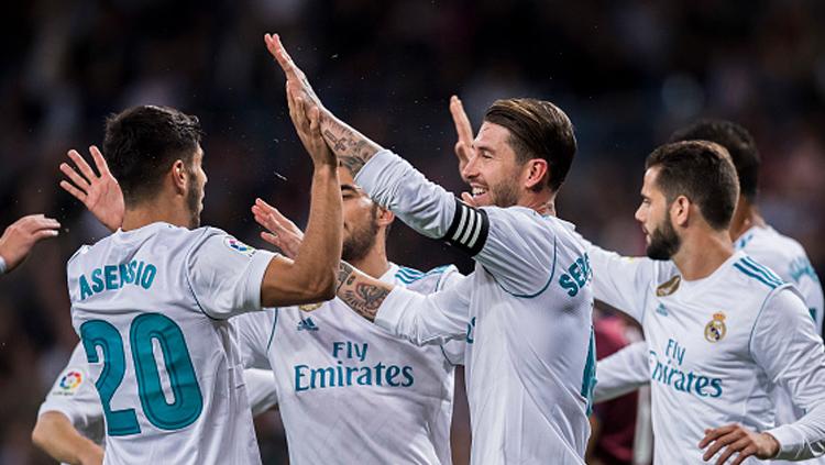 Selebrasi para pemain Real Madrid. Copyright: INDOSPORT