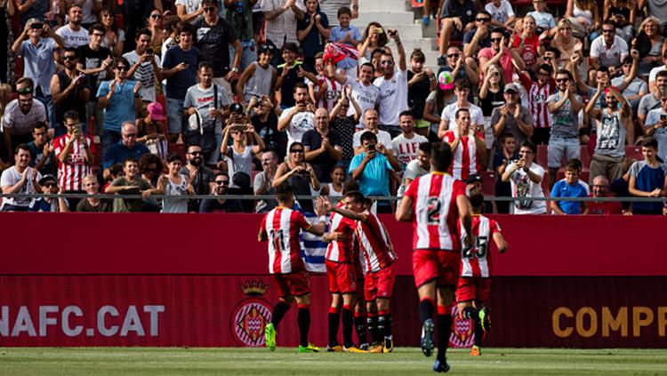 Para pemain Girona FC melakukan selebrasi. Copyright: INDOSPORT