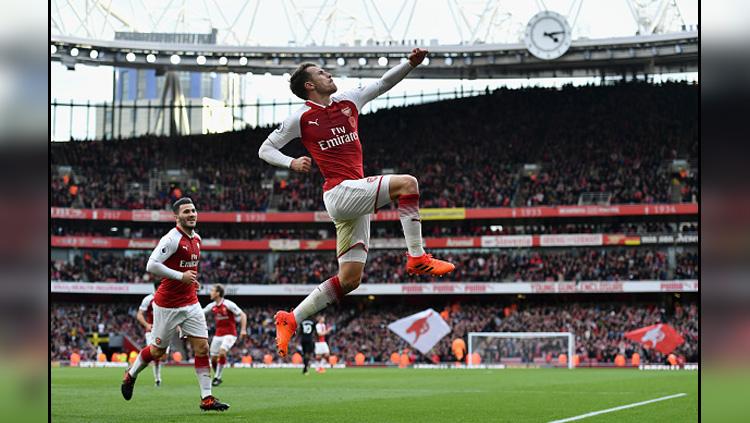Selebrasi pemain Arsenal, Aaron Ramsey saat memberikan kemenangan untuk Arsenal. Copyright: INDOSPORT