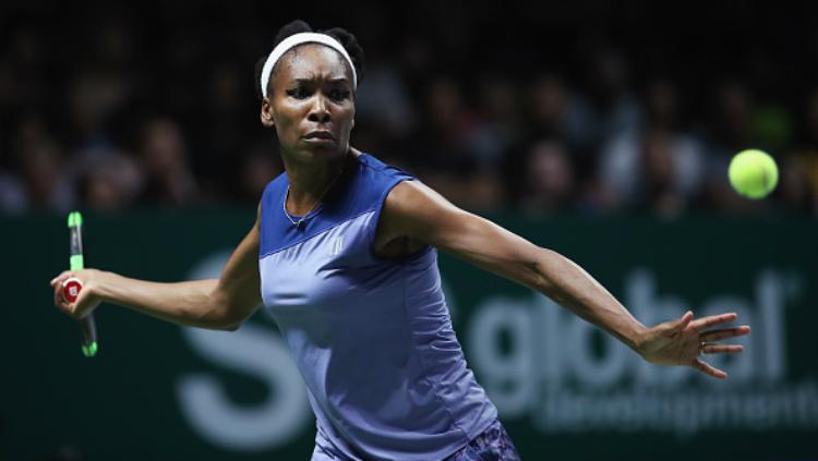 Venus Williams beraksi di partai puncak WTA Finals. Copyright: INDOSPORT