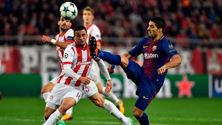 Barcelona vs Olympiakos Piraeus. Copyright: INDOSPORT