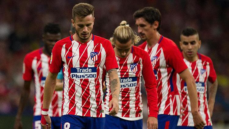 Skuat Atletico Madrid tertunduk lesu. Copyright: Getty Images
