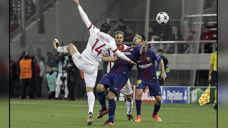 Barcelona vs Olympiacos. Copyright: INDOSPORT