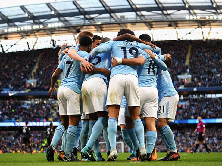 Selebrasi para pemain Man City. Copyright: INDOSPORT