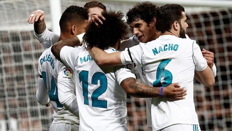 Selebrasi para pemain Real Madrid. Copyright: INDOSPORT