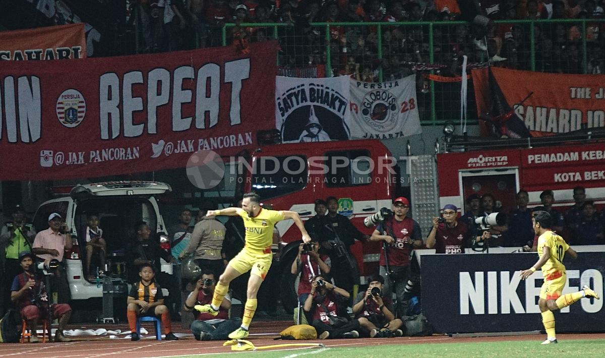 Selebrasi Spasojevic setelah membobol gawang Persija Jakarta.