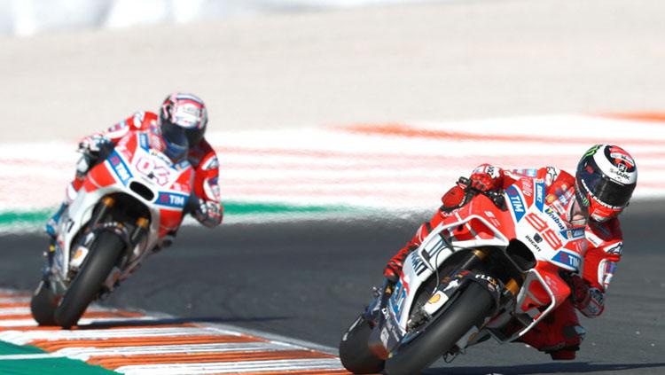 Andrea Dovizioso dan Jorge Lorenzo. Copyright: LAT IMAGES