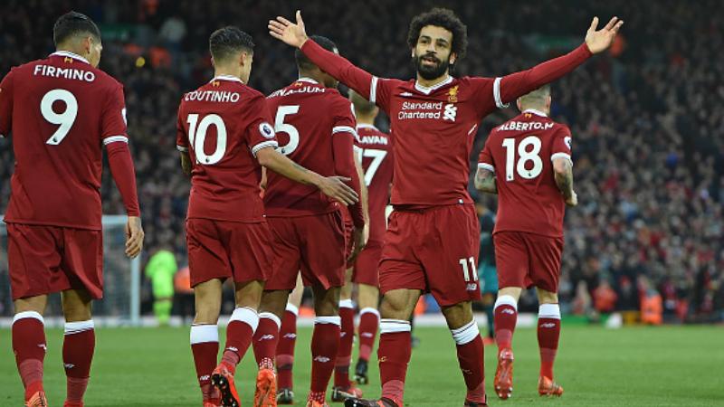 Mohamed Salah melakukan selebrasi pascamencetak gol kedua.