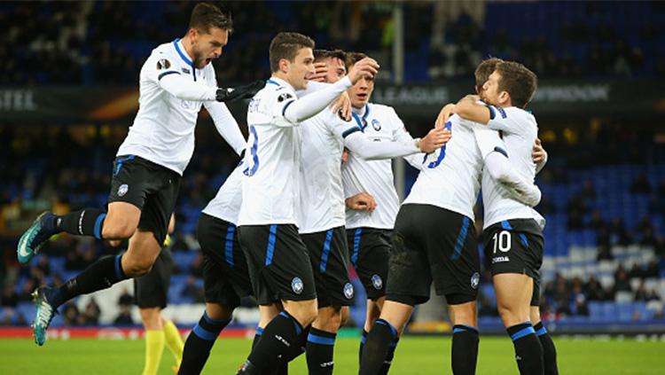 Para pemain Atalanta melakukan selebrasi. Copyright: INDOSPORT