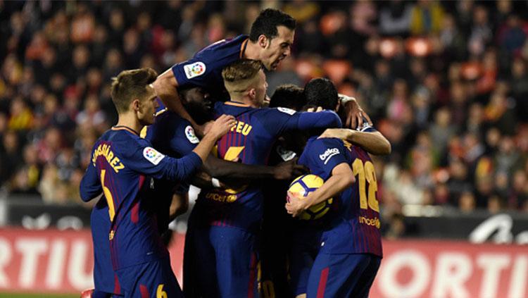 Para pemain Barcelona berselebrasi usai mencetak gol. Copyright: INDOSPORT