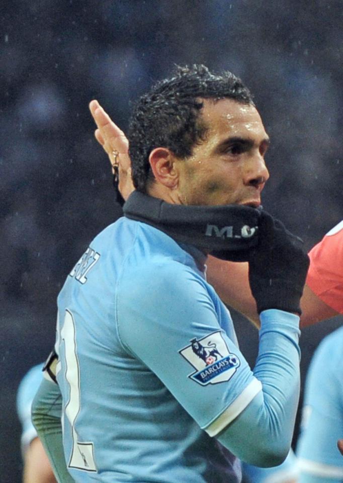 Carloz Tevez with snood Copyright: The Sun