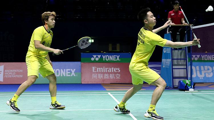Pasangan ganda putra Kevin Sanjaya Sukamuljo/Marcus Fernaldi Gideon di ajang Dubai World Super Series Finals 2017.