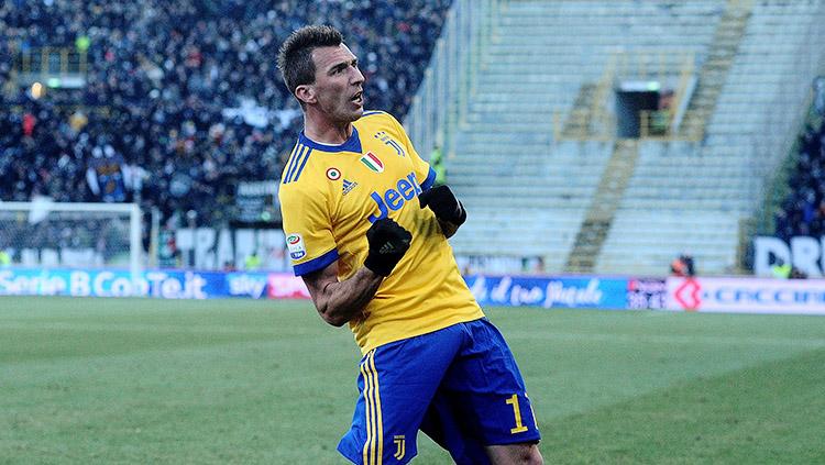 Aksi selebrasi Mario Mandzukic usai cetak gol ke gawang Bologna pada menit ke-36. Copyright: INDOSPORT