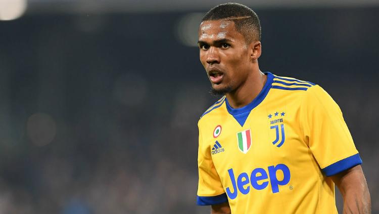 Douglas Costa, pemain Juventus. Copyright: INDOSPORT