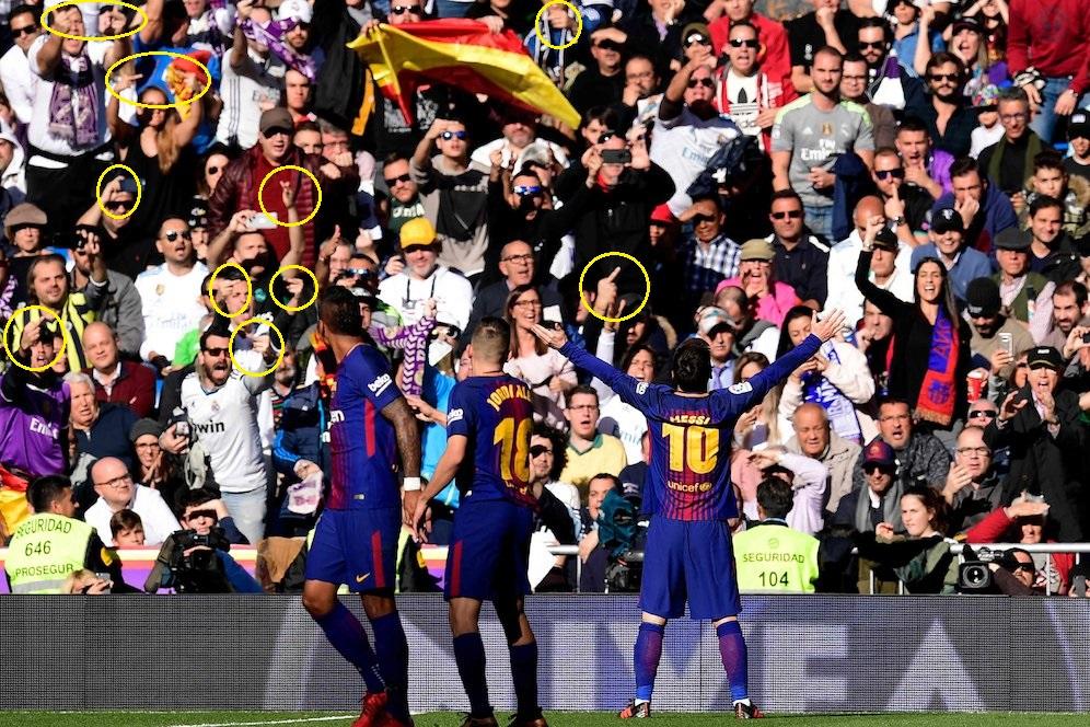 Suporter Real Madrid acungkan jari tengah ke Lionel Messi Copyright: bola.net