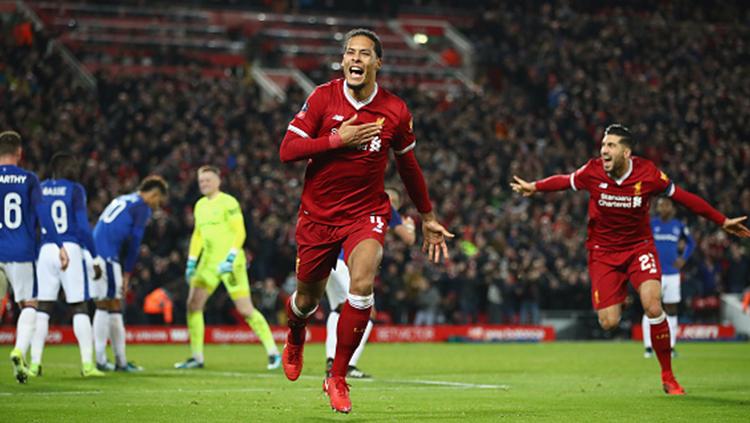 Virgil van Dijk usai merayakan gol debutnya bersama Liverpool Copyright: INDOSPORT