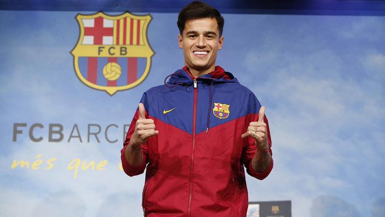 Philippe Coutinho saat diperkenalkan secara resmi oleh Barcelona kepada awiak media. Copyright: INDOSPORT