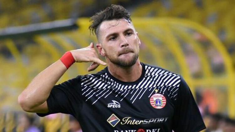 Marko Simic melakukan selebrasi usai mencetak gol pertama. Copyright: Media Persija