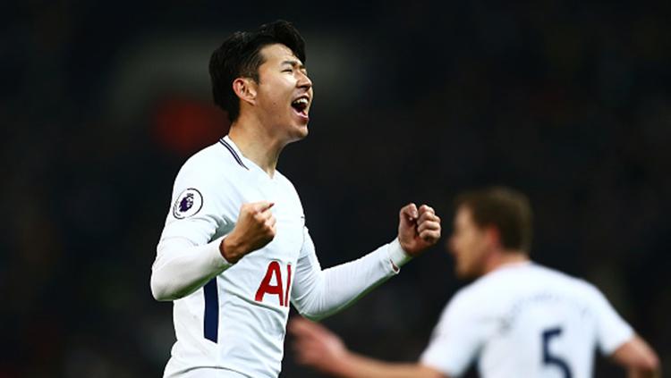 Heung-Min Son melakukan selebrasi usai mencetak gol. Copyright: INDOSPORT