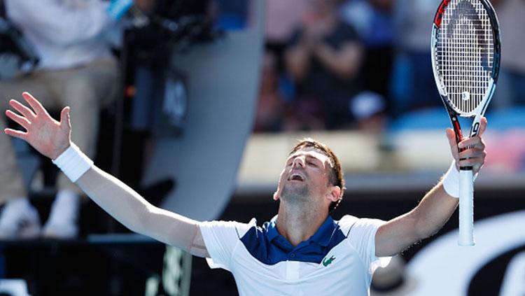 Novak Djokovic selebrasi di ajang Australia Terbuka 2018. - INDOSPORT