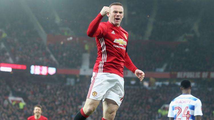 Wayne Rooney selebrasi saat bersama Man United. Copyright: INDOSPORT