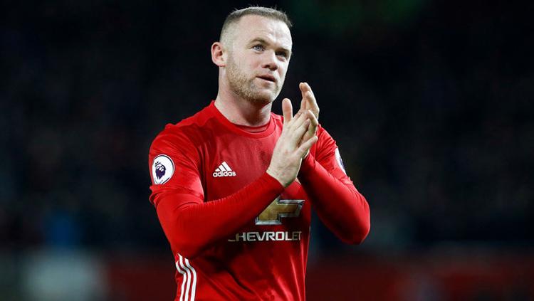 Wayne Rooney selebrasi saat bersama Man United. Copyright: Getty Images