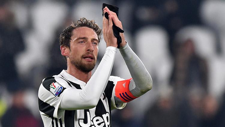 Claudio Marchisio pada laga saat melawan Genoa. Copyright: Getty Images