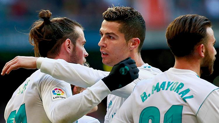 Gareth Bale (kiri) selebrasi bersama Cristiano Ronaldo dan Borja Mayoral.