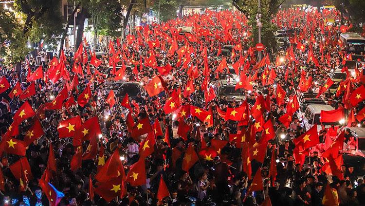 Masyarakat Vietnam melakukan konvoi usai Timnasnya lolos ke final Piala Asia U-23. Copyright: Istimewa