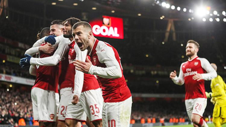 Aksi selebrasi pemain Arsenal menang atas Chelsea dengan skor 2-1. Copyright: INDOSPORT