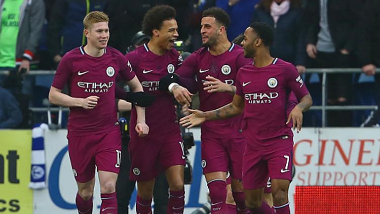 Para pemain Manchester City merayakan gol ke gawang Cardiff City. Copyright: INDOSPORT