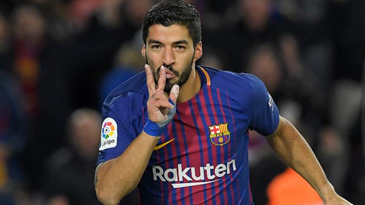 Luis Suarez berselebrasi usai cetak gol ke gawang Valencia di semifinal Copa del Rey 2017/18. Copyright: INDOSPORT