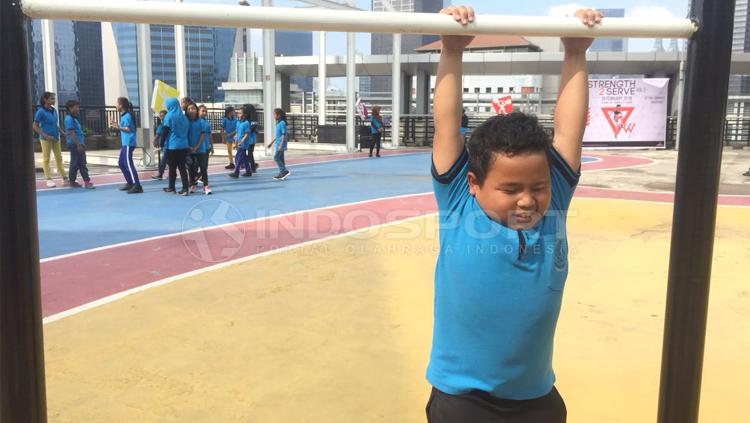 Heri, salah satu anak yayasan SAJA yang mengikuti acara buatan Workout Embassy.