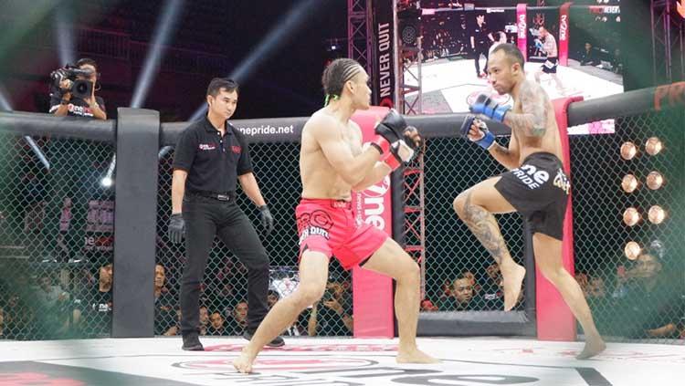 Randy Pangalila vs Fajar Ibel.