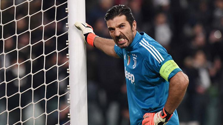 Ekspresi wajah Gianluigi Buffon pada laga saat melawan Tottenham Hotspur. Copyright: INDOSPORT