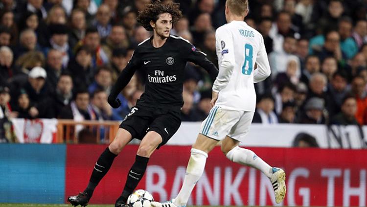 Adrien Rabiot saat melawan Real Madrid di babak 16 besar Liga Champions. Copyright: INDOSPORT