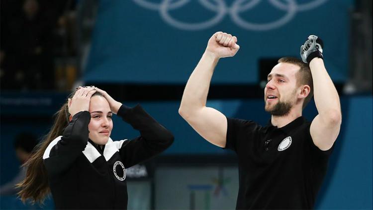 Alexander Krushelnitsky dan Anastasia Bryzgalova adalah atlet curling Rusia. Copyright: themoscowtimes.com