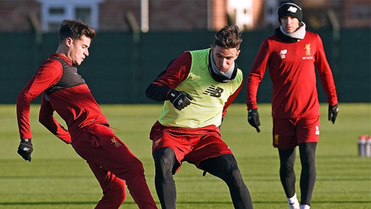 Marko Grujic dan Philippe Coutinho sedang latihan saat keduanya masih bermain untuk Liverpool. Copyright: INDOSPORT