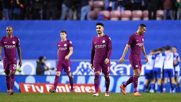 Manchester City takluk dari Wigan Athletic. Copyright: INDOSPORT