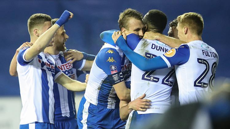 Aksi selebrasi para pemain Wigan Athletic. Copyright: INDOSPORT