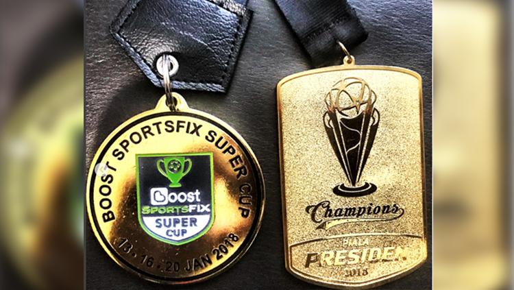 Medali Sportsfix Super Cup dan Piala Presiden 2018 yang dimenangkan Ivan Carlos bersama Persija. Copyright: Ivan Carlos