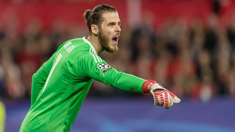 David de Gea saat memberikan instruksi kepada rekannya. Copyright: INDOSPORT